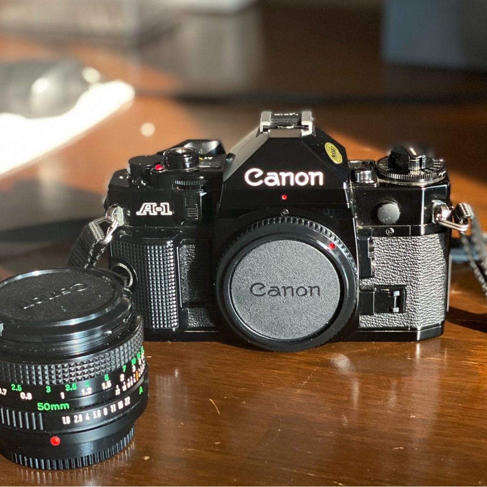 Canon A-1 35mm film SLR camera with a 50mm lens included- Excellent condition